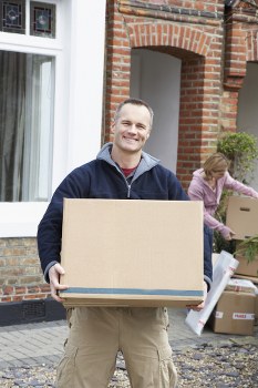 Professional same day removals team handling urgent moving boxes in Mayfair
