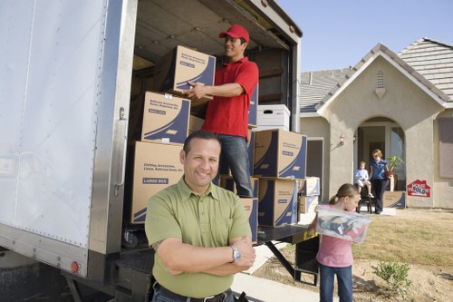 Professional movers handling valuable household items in Mayfair