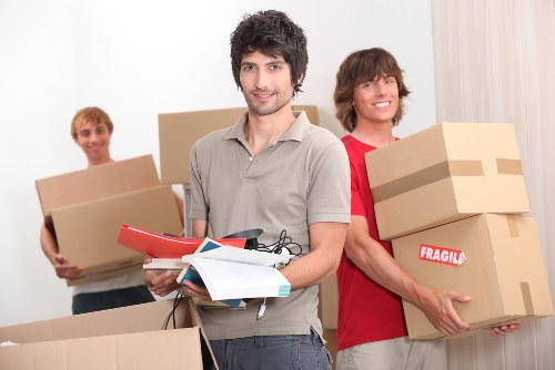 Customer booking details and moving checklist on a clipboard