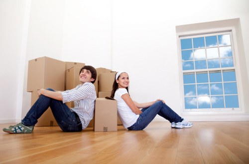 Professional house removals planning in Mayfair with moving boxes and a removal van