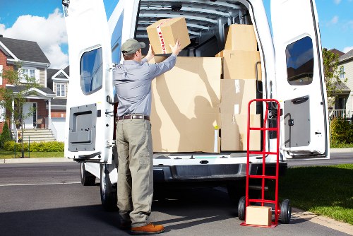Careful loading of boxes and furniture for a move in Mayfair