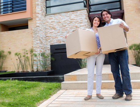Professional movers handling furniture in Mayfair